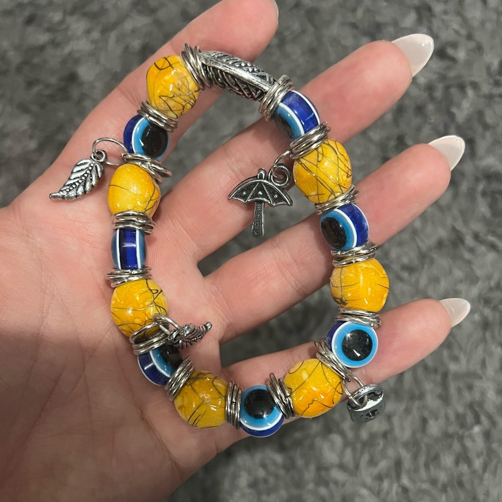 Charm bracelet 💙💛